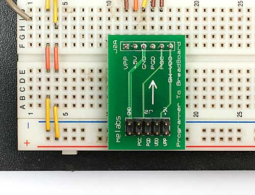 An melabs 10-pin ICSP connection on a solderless breadboard: